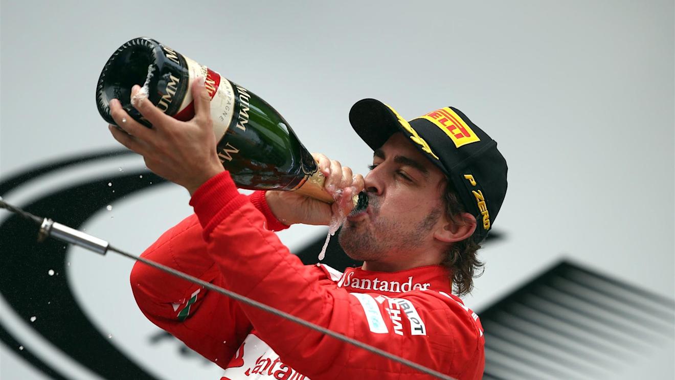 Third placed Fernando Alonso (ESP) Ferrari, drinks champagne on the podium. Formula One World Championship, Rd4, Chinese Grand Prix, Race, Shanghai, China, Sunday, 20 April 2014