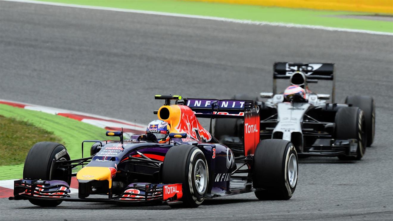Daniel Ricciardo (AUS) Red Bull Racing RB10 leads Jenson Button (GBR) McLaren MP4-29. Formula One World Championship, Rd5, Spanish Grand Prix, Race, Barcelona, Spain, Sunday, 11 May 2014