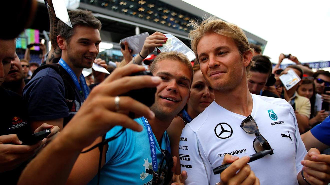 Nico Rosberg (GER) Mercedes AMG F1 signs autographs for the fans. Formula One World Championship, Rd8, Austrian Grand Prix, Preparations, Spielberg, Austria, Thursday, 19 June 2014