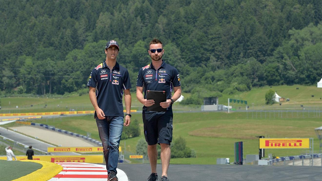 Daniel Ricciardo (AUS) Red Bull Racing walks the track with Simon Rennie (GBR) Red Bull Racing Race Engineer. Formula One World Championship, Rd8, Austrian Grand Prix, Preparations, Spielberg, Austria, Thursday, 19 June 2014