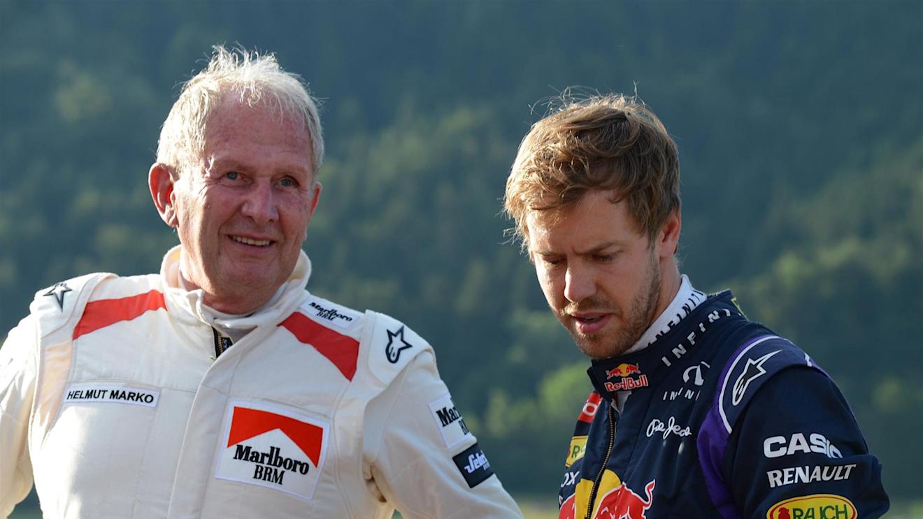 Dr Helmut Marko (AUT) Red Bull Motorsport Consultant and Sebastian Vettel (GER) Red Bull Racing. Formula One World Championship, Rd8, Austrian Grand Prix, Qualifying, Spielberg, Austria, Saturday, 21 June 2014