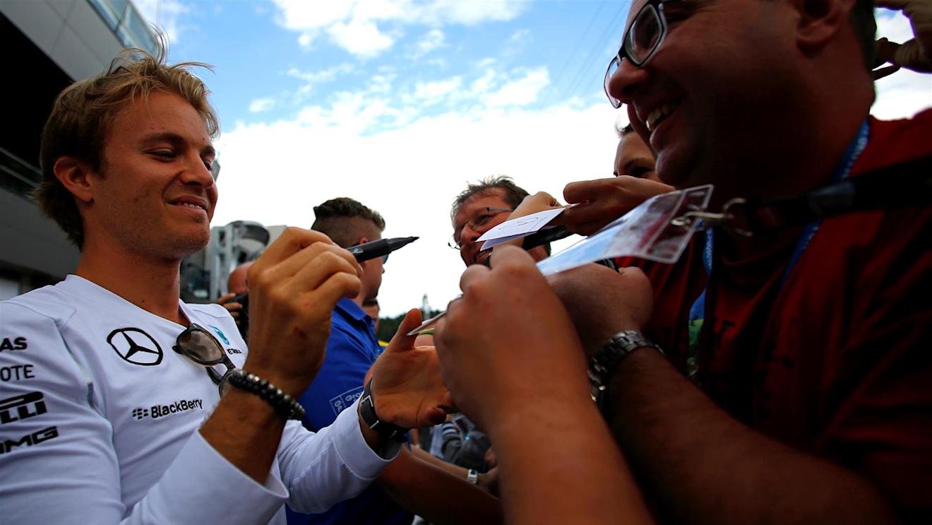 Nico Rosberg (GER) Mercedes AMG F1 signs autographs for the fans. Formula One World Championship, Rd8, Austrian Grand Prix, Preparations, Spielberg, Austria, Thursday, 19 June 2014