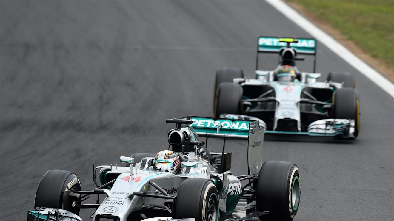 Lewis Hamilton (GBR) Mercedes AMG F1 W05 leads Nico Rosberg (GER) Mercedes AMG F1 W05. Formula One World Championship, Rd11, Hungarian Grand Prix, Race Day, Hungaroring, Hungary. Sunday, 27 July 2014 © Sutton Images. No reproduction without permission