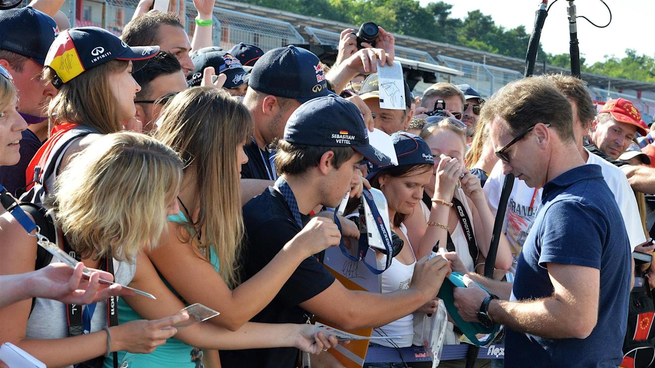 Christian Horner (GBR) Red Bull Racing Team Principal signs autographs for the fans. Formula One World Championship, Rd10, German Grand Prix, Preparations, Hockenheim, Germany, Thursday, 17 July 2014 © Sutton Images. No reproduction without permission