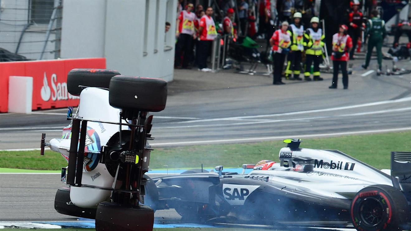 Felipe Massa (BRA) Williams FW36 crashed and rolled after colliding with Kevin Magnussen (DEN) McLaren MP4-29 at the start of the race. Formula One World Championship, Rd10, German Grand Prix, Race Day, Hockenheim, Germany, Sunday, 20 July 2014 © Sutton Images. No reproduction without permission