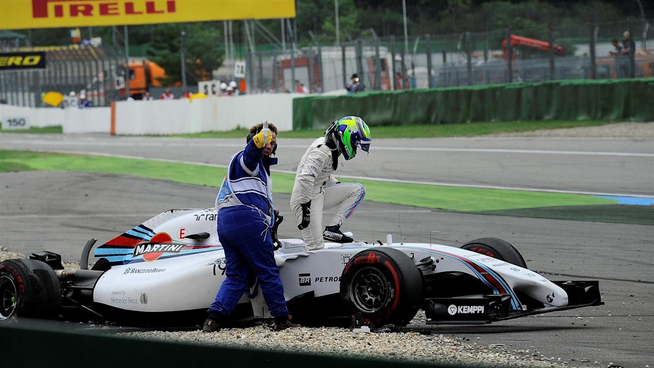 Felipe Massa (BRA) Williams FW36 crashes and rolls at the start of the race. A marshall gives the thumbs up to signal that he's uninjured. Formula One World Championship, Rd10, German Grand Prix, Race Day, Hockenheim, Germany, Sunday, 20 July 2014 © Sutton Images. No reproduction without permission