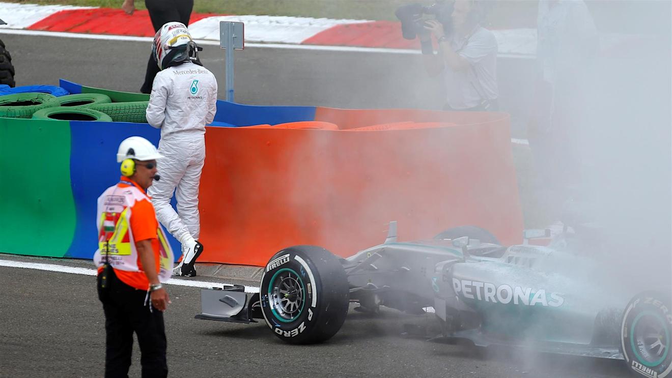 Lewis Hamilton (GBR) Mercedes AMG F1 W05 with a fire in Q1. Formula One World Championship, Rd11, Hungarian Grand Prix, Qualifying, Hungaroring, Hungary. Saturday, 26 July 2014 © Sutton Images. No reproduction without permission