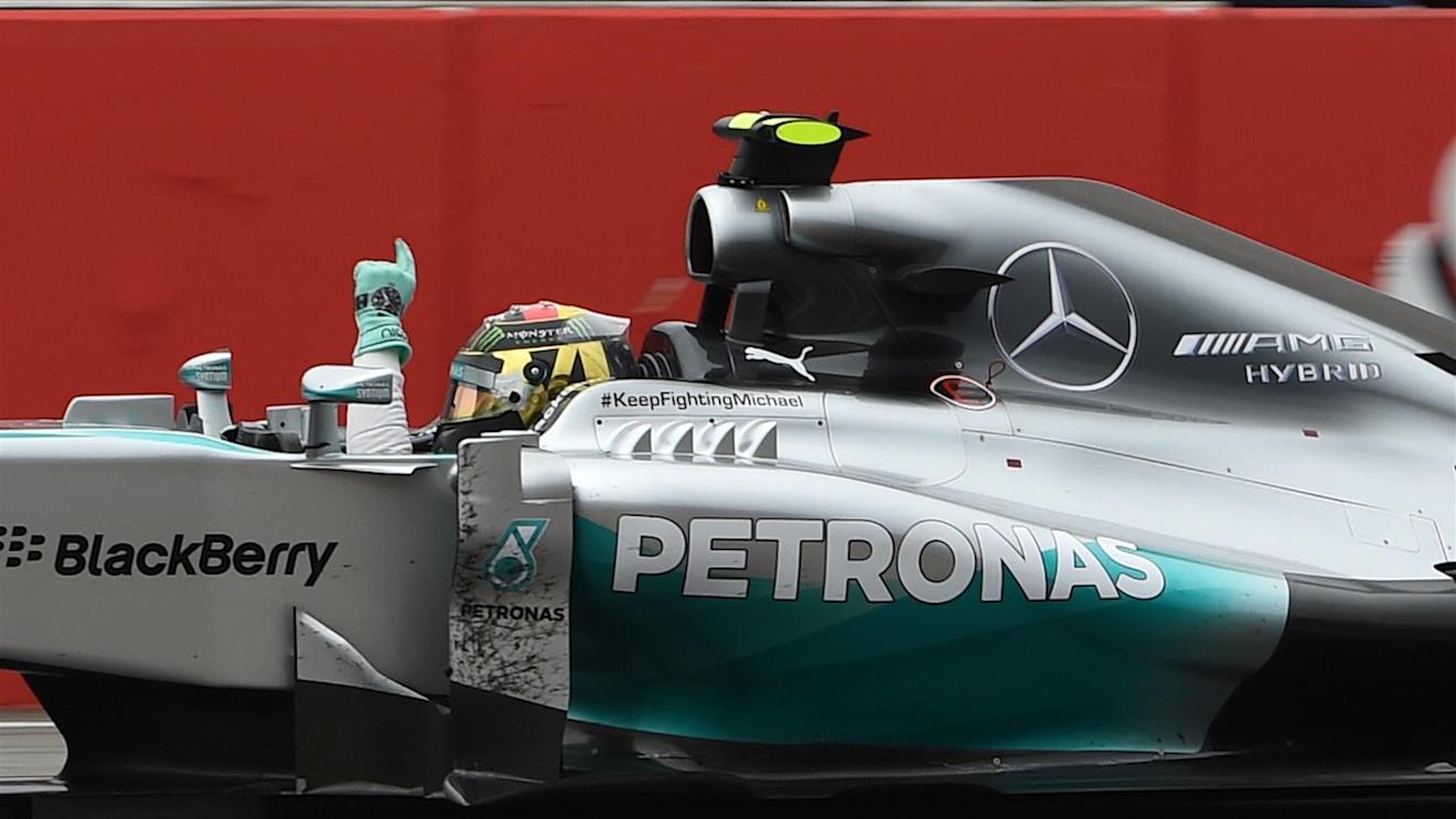 Race winner Nico Rosberg (GER) Mercedes AMG F1 W05 crosses the line. Formula One World Championship, Rd10, German Grand Prix, Race Day, Hockenheim, Germany, Sunday, 20 July 2014 © Sutton Images. No reproduction without permission