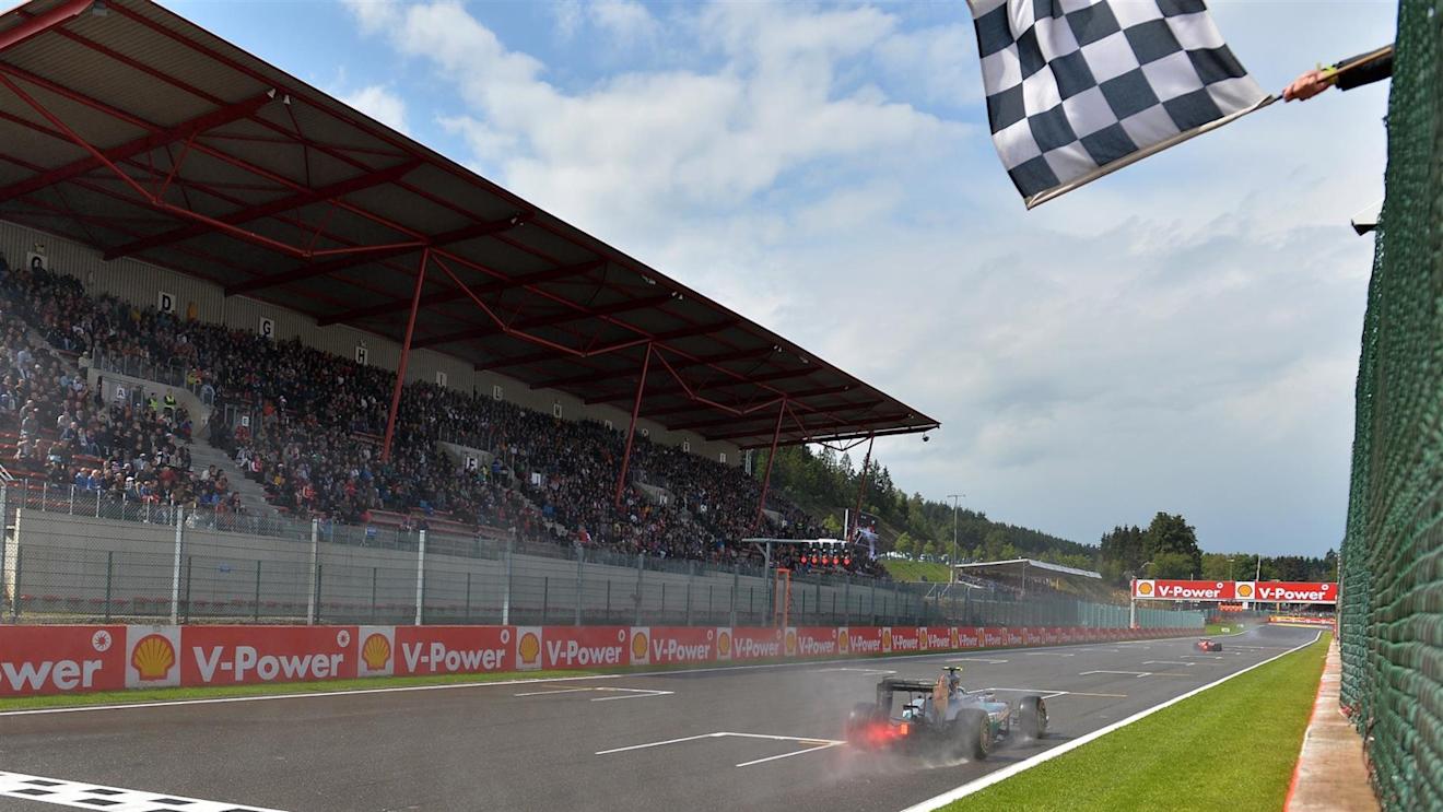 Nico Rosberg (GER) Mercedes AMG F1 W05 takes the chequered flag at the end of the session. Formula One World Championship, Rd12, Belgian Grand Prix, Qualifying, Spa-Francorchamps, Belgium, Saturday, 23 August 2014 © Sutton Images. No reproduction without permission