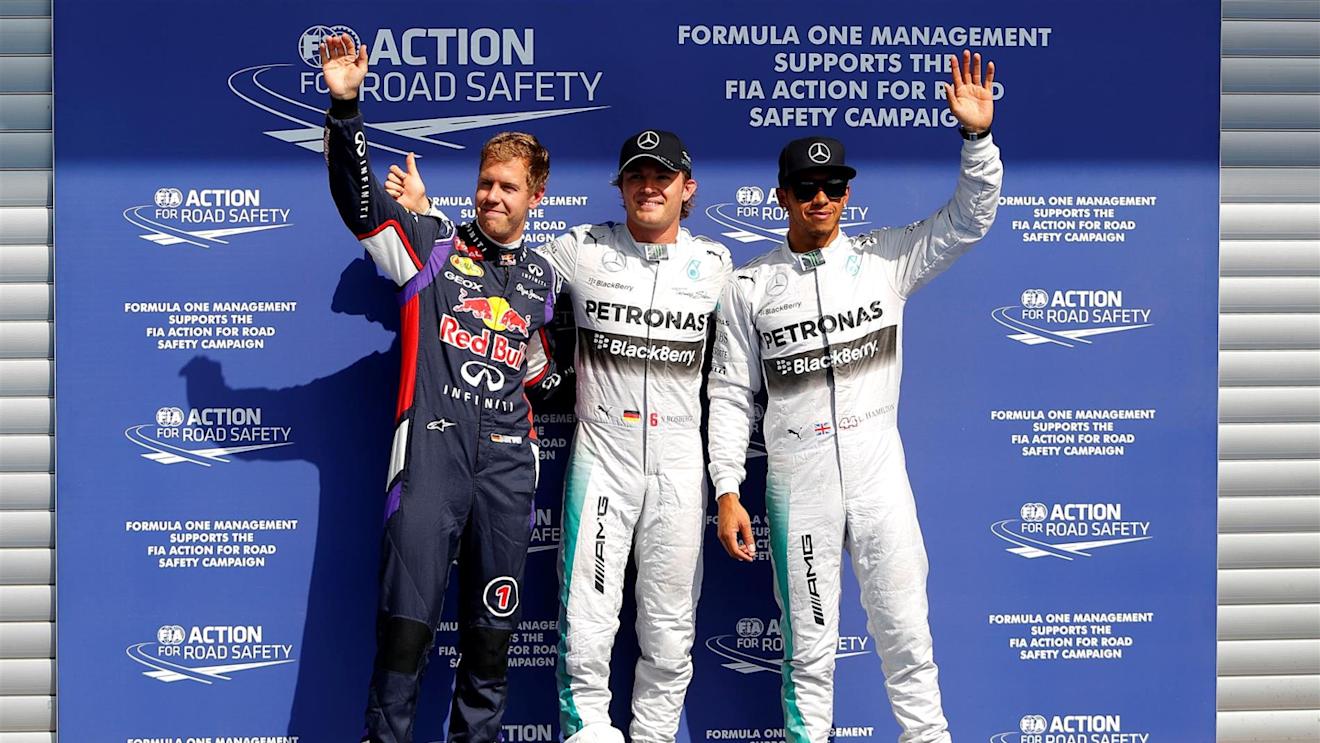 (L to R): Sebastian Vettel (GER) Red Bull Racing, pole sitter Nico Rosberg (GER) Mercedes AMG F1 and Lewis Hamilton (GBR) Mercedes AMG F1 celebrate in parc ferme. Formula One World Championship, Rd12, Belgian Grand Prix, Qualifying, Spa-Francorchamps, Belgium, Saturday, 23 August 2014 © Sutton Images. No reproduction without permission