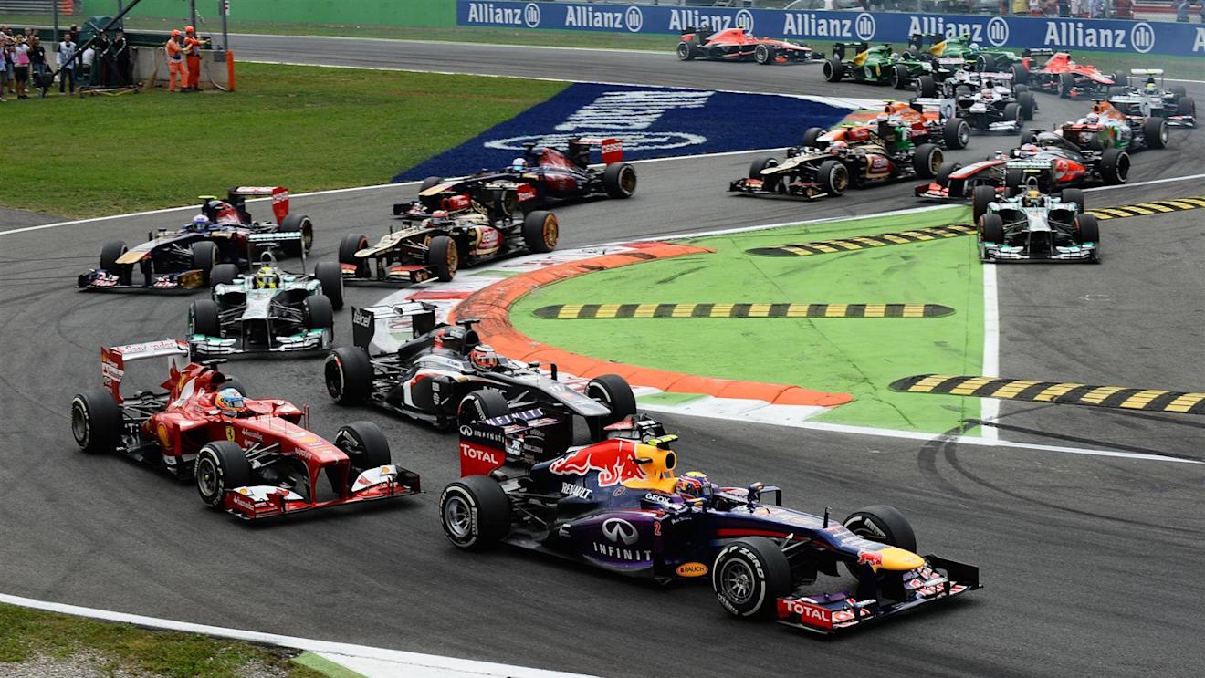 Mark Webber (AUS) Red Bull Racing RB9 leads Felipe Massa (BRA) Ferrari F138 and Nico Hulkenberg (GER) Sauber C32 at the start of the race. Formula One World Championship, Rd12, Italian Grand Prix, Race, Monza, Italy, Sunday, 8 September 2013 © Sutton Images. No reproduction without permission