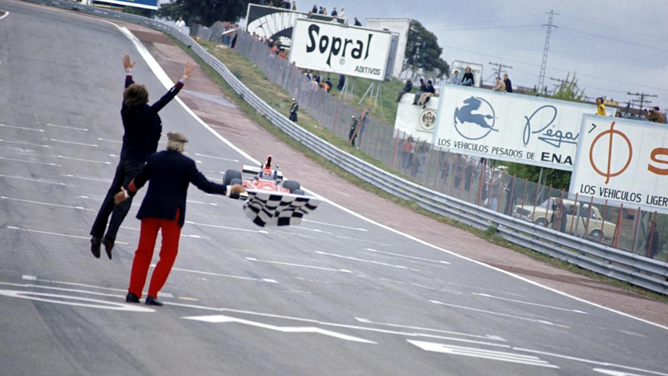 Luca di Montezemolo (ITA) Ferrari Team Manager jumps for joy as Niki Lauda (AUT) Ferrari 312B3 crosses the finish line to take his first GP victory. Spanish Grand Prix, Jarama, 28 April 1974 © Sutton Images. No reproduction without permission