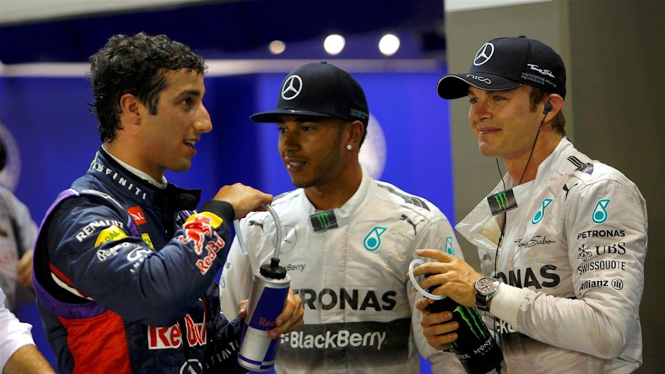 (L to R): Daniel Ricciardo (AUS) Red Bull Racing, pole sitter Lewis Hamilton (GBR) Mercedes AMG F1 and Nico Rosberg (GER) Mercedes AMG F1 celebrate in parc ferme. Formula One World Championship, Rd14, Singapore Grand Prix, Marina Bay Street Circuit, Singapore, Qualifying, Saturday, 20 September 2014 © Sutton Images. No reproduction without permission