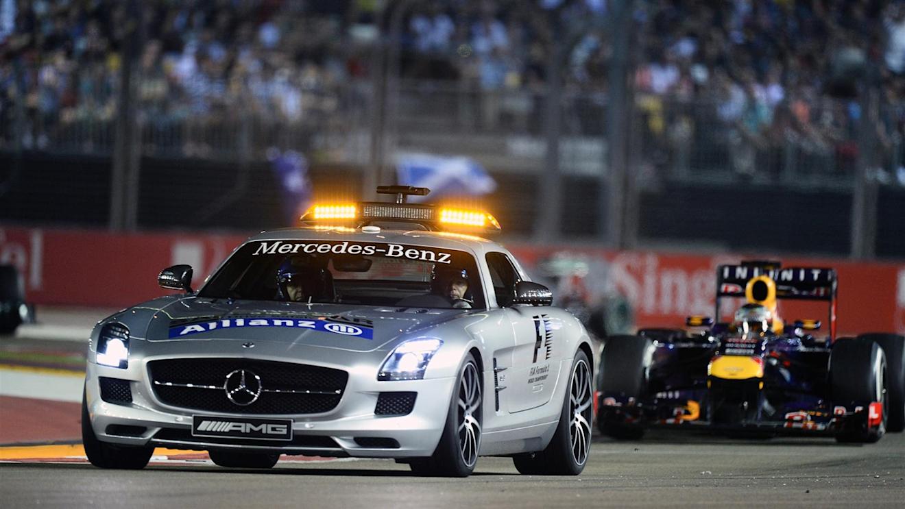 Sebastian Vettel (GER) Red Bull Racing RB9 follows the Safety Car. Formula One World Championship, Rd13, Singapore Grand Prix, Race, Marina Bay Street Circuit, Singapore, Sunday, 22 September 2013 © Sutton Images. No reproduction without permission