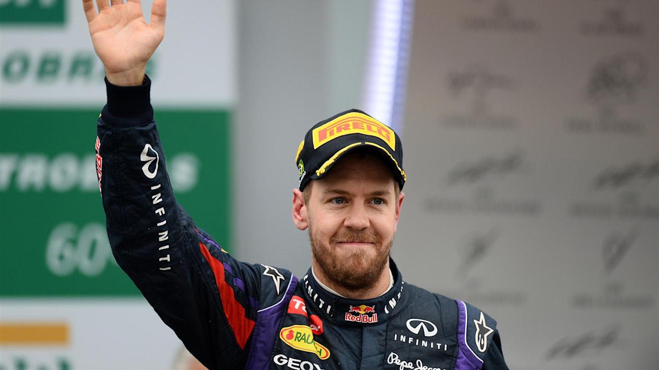 Race winner Sebastian Vettel (GER) Red Bull Racing on the podium. Formula One World Championship, Rd19, Brazilian Grand Prix, Race, Sao Paulo, Brazil, Sunday, 24 November 2013. © Sutton Images