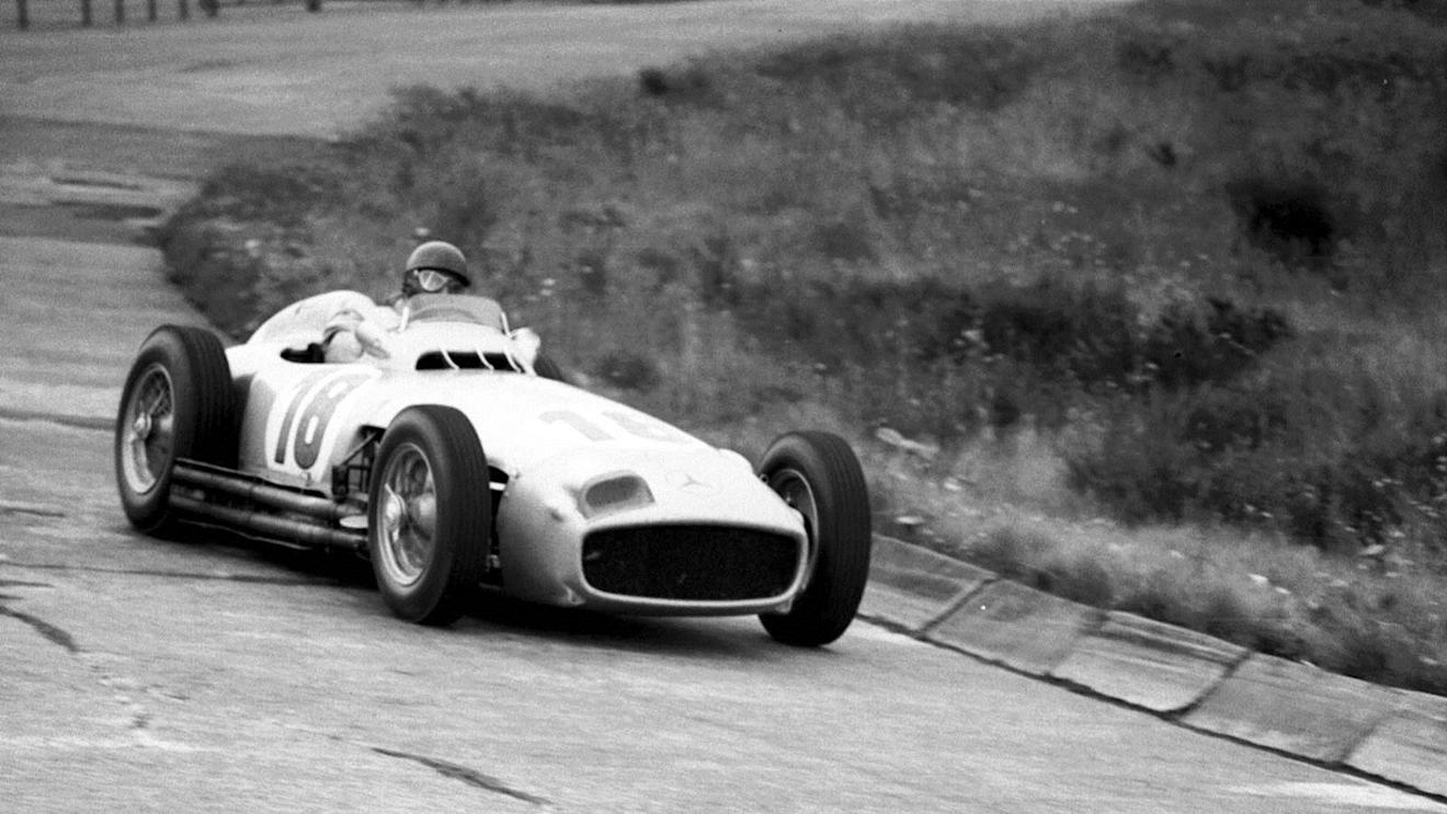 1954 German Grand Prix. Nurburgring, Germany. 30/7-1/8 1954. Juan Manuel Fangio (Mercedes-Benz W196) 1st position. © LAT Photographic