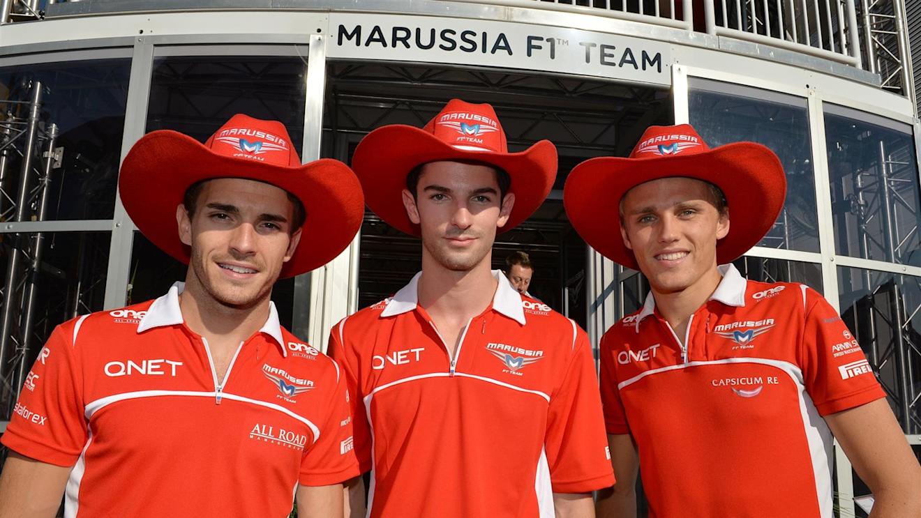 (L to R): Jules Bianchi (FRA) Marussia F1 Team, Alexander Rossi (ITA) Marussia and Max Chilton (GBR) Marussia F1 Team with the USGP cowboy hat. Formula One World Championship, Rd13, Italian Grand Prix, Monza, Italy, Qualifying, Saturday, 6 September 2014