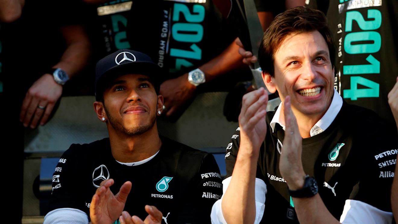Race winner Lewis Hamilton (GBR) Mercedes AMG F1 and Toto Wolff (AUT) Mercedes AMG F1 Director of Motorsport celebrate. Formula One World Championship, Rd16, Russian Grand Prix, Race, Sochi Autodrom, Sochi, Krasnodar Krai, Russia, Sunday, 12 October 2014