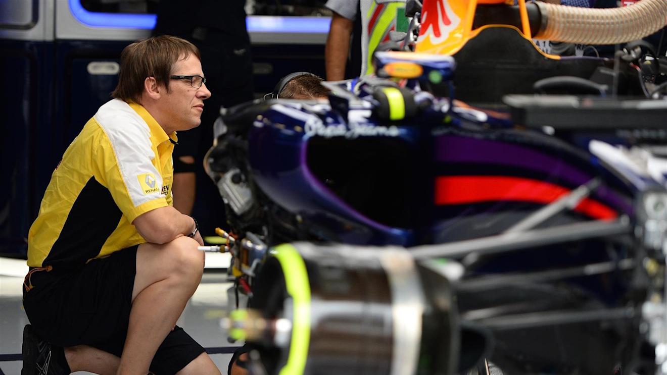 Renault Sport Engineer looks at the Red Bull Racing RB10. Formula One World Championship, Rd13, Italian Grand Prix, Monza, Italy, Practice, Friday, 5 September 2014