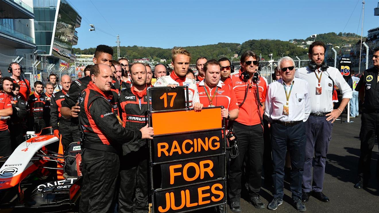 Max Chilton (GBR) Marussia F1 Team; Dave Greenwood (GBR) Marussia Chief Engineer; Graeme Lowdon (GBR) Marussia F1 President; Sporting Director and Charlie Whiting (GBR) FIA Delegate and Matteo Bonciani (ITA) FIA Media Delegate, remember the injured Jules Bianchi (FRA) Marussia F1 Team. Formula One World Championship, Rd16, Russian Grand Prix, Race, Sochi Autodrom, Sochi, Krasnodar Krai, Russia, Sunday, 12 October 2014