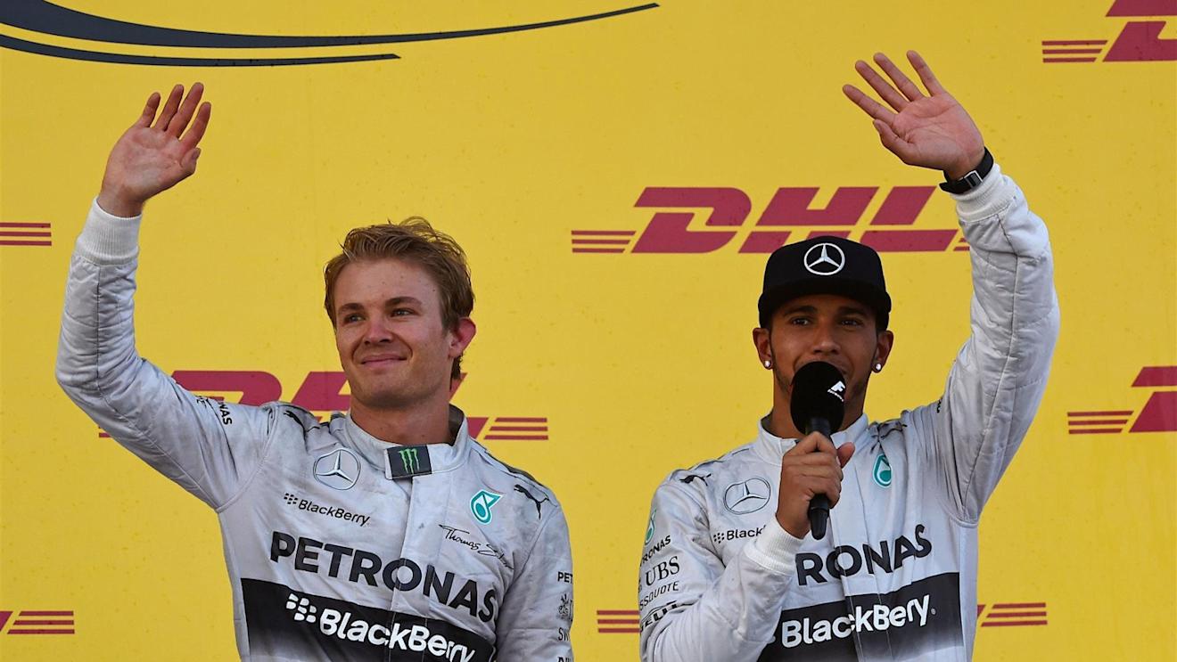 (L to R): Second placed Nico Rosberg (GER) Mercedes AMG F1 and winner Lewis Hamilton (GBR) Mercedes AMG F1 on the podium. Formula One World Championship, Rd16, Russian Grand Prix, Race, Sochi Autodrom, Sochi, Krasnodar Krai, Russia, Sunday, 12 October 2014