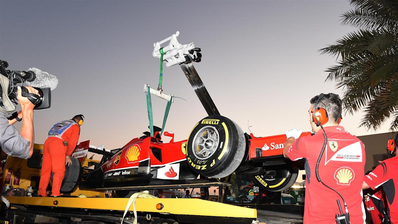 The car of Fernando Alonso (ESP) Ferrari F14 T is recovered after stopping on track in FP2. Formula One World Championship, Rd19, Abu Dhabi Grand Prix, Practice, Yas Marina Circuit, Abu Dhabi, UAE, Friday, 21 November 2014 © Sutton Images. No reproduction without permission