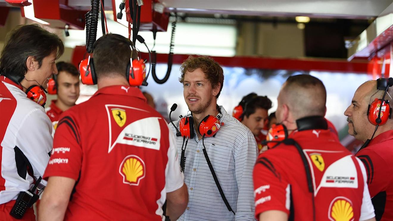 Sebastian Vettel (GER) Ferrari meets the Ferrari team members. Formula One Testing, Yas Marina Circuit, Abu Dhabi, UAE, Tuesday, 25 November 2014