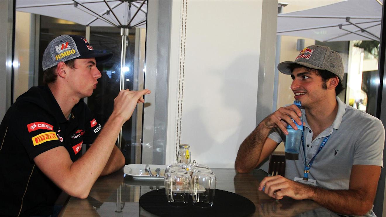 (L to R): Max Verstappen (NDL) Scuderia Toro Rosso and Carlos Sainz Jr (ESP). Formula One World Championship, Rd19, Abu Dhabi Grand Prix, Race, Yas Marina Circuit, Abu Dhabi, UAE, Sunday, 23 November 2014