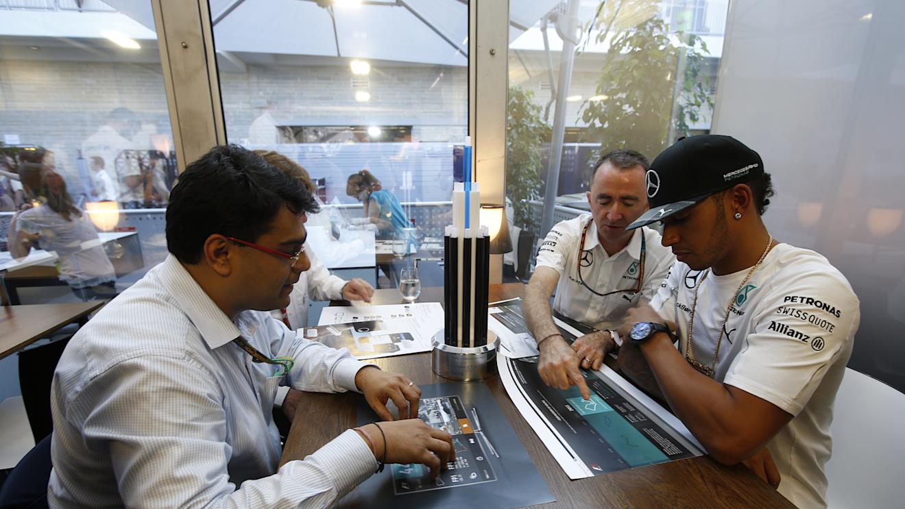 Judges discuss Tata Communications' inaugural F1 Connectivity Innovation Prize: (L to R) Mehul Kapadia, MD of the F1 Business, Tata Communications, Mercedes AMG Petronas team Executive Director (Technical), Paddy Lowe, and Mercedes driver Lewis Hamilton. © Tata Communications