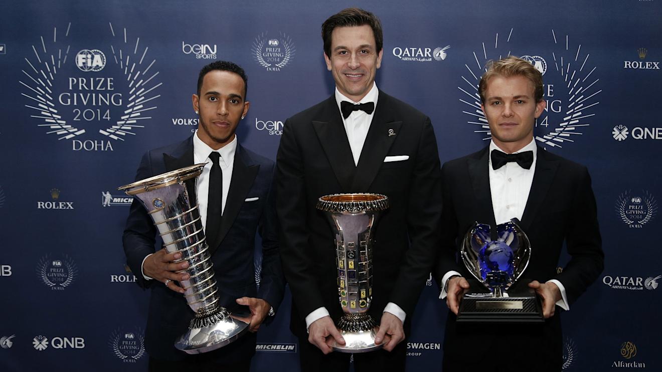 (L to R) Mercedes' Lewis Hamilton, Toto Wolff and Nico Rosberg during the FIA Prize Giving 2014 on December 5th 2014, at Doha, Qatar. © Jean Michel Le Meur / DPPI