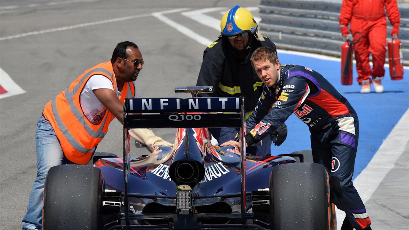 Sebastian Vettel (GER) Red Bull Racing RB10 pushes his car in pit lane. Formula One Testing, Day Three, Bahrain International Circuit, Sakhir, Bahrain, Saturday, 1 March 2014 © Sutton Images. No reproduction without permission