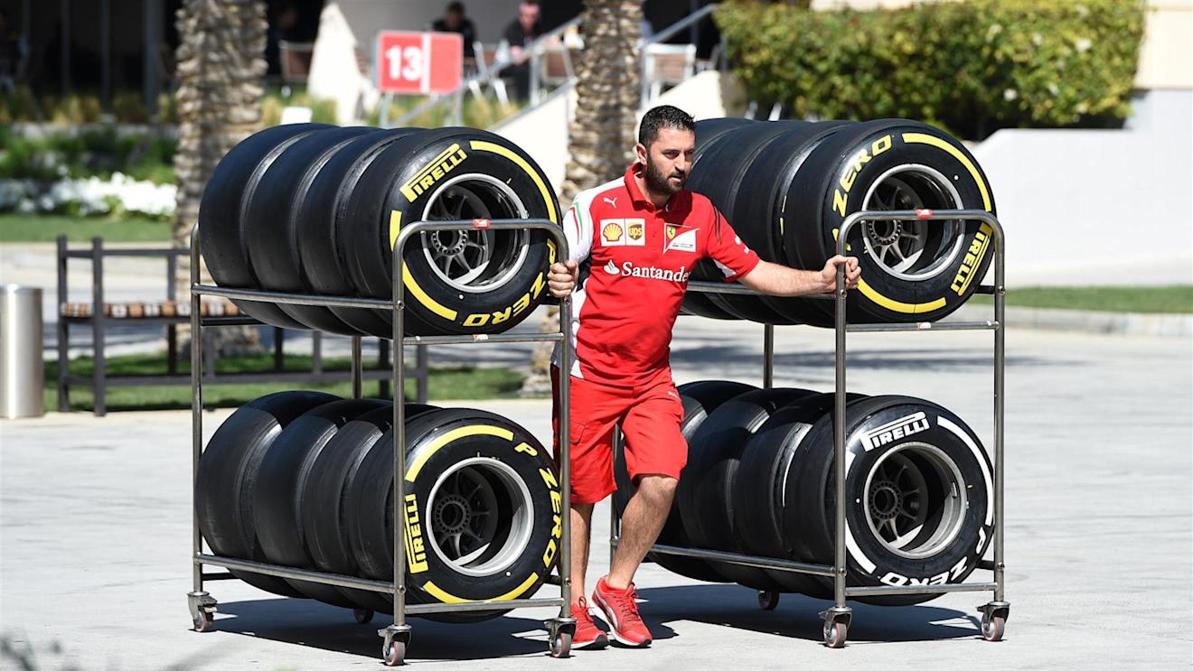 Ferrari mechanic with Pirelli tyres. Formula One Testing, Day Three, Bahrain International Circuit, Sakhir, Bahrain, Friday, 21 February 2014 © Sutton Images. No reproduction without permission