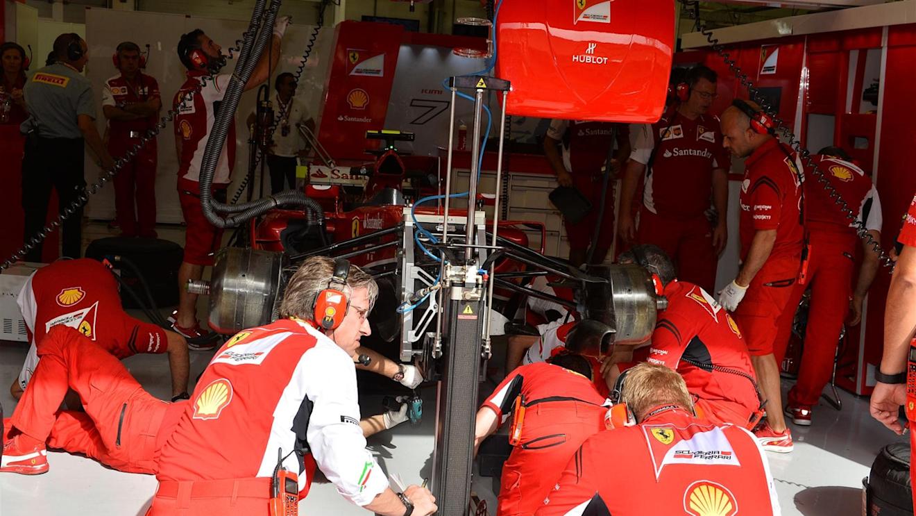 Pat Fry (GBR) Ferrari Technical Director supervises Ferrari engineers working on the car of Kimi Raikkonen (FIN) Ferrari F14 T. Formula One World Championship, Rd3, Bahrain Grand Prix, Practice, Bahrain International Circuit, Sakhir, Bahrain, Friday, 4 April 2014. © Sutton Images
