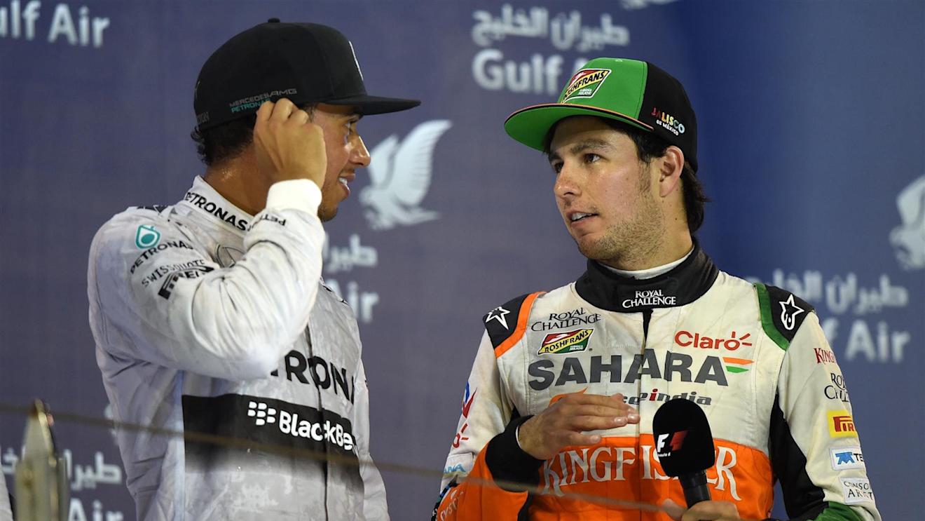 Lewis Hamilton (GBR) Mercedes AMG F1 and Sergio Perez (MEX) Force India on the podium. Formula One World Championship, Rd3, Bahrain Grand Prix, Race, Bahrain International Circuit, Sakhir, Bahrain, Sunday, 6 April 2014. © Sutton Images