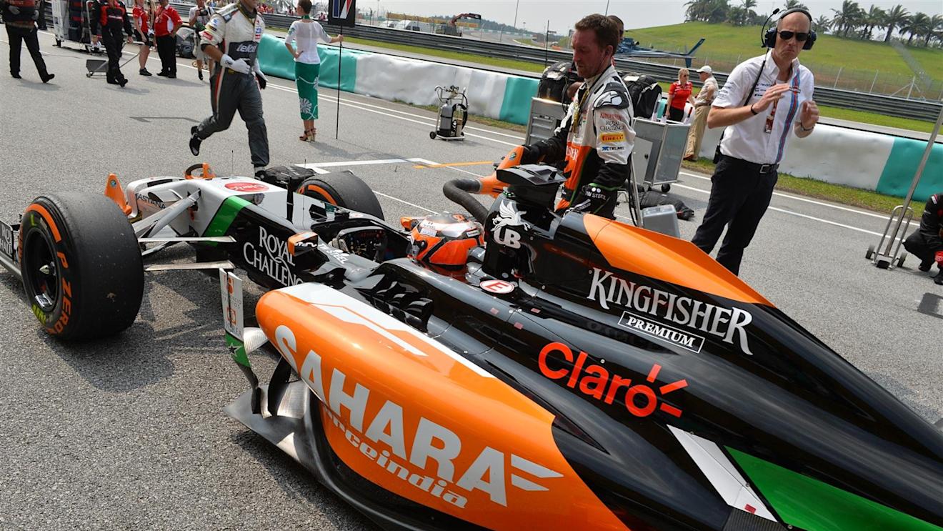 Nico Hulkenberg (GER) Force India VJM07 on the grid. Formula One World Championship, Rd2, Malaysian Grand Prix, Race, Sepang, Malaysia, Sunday, 30 March 2014. © Sutton Images