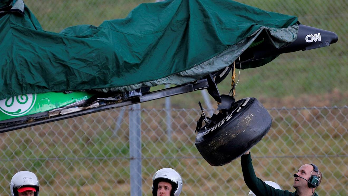 The crashed car of Kamui Kobayashi (JPN) Caterham CT05 is recovered. Formula One Testing, Day One, Barcelona, Spain, Tuesday, 13 May 2014. © Sutton Images