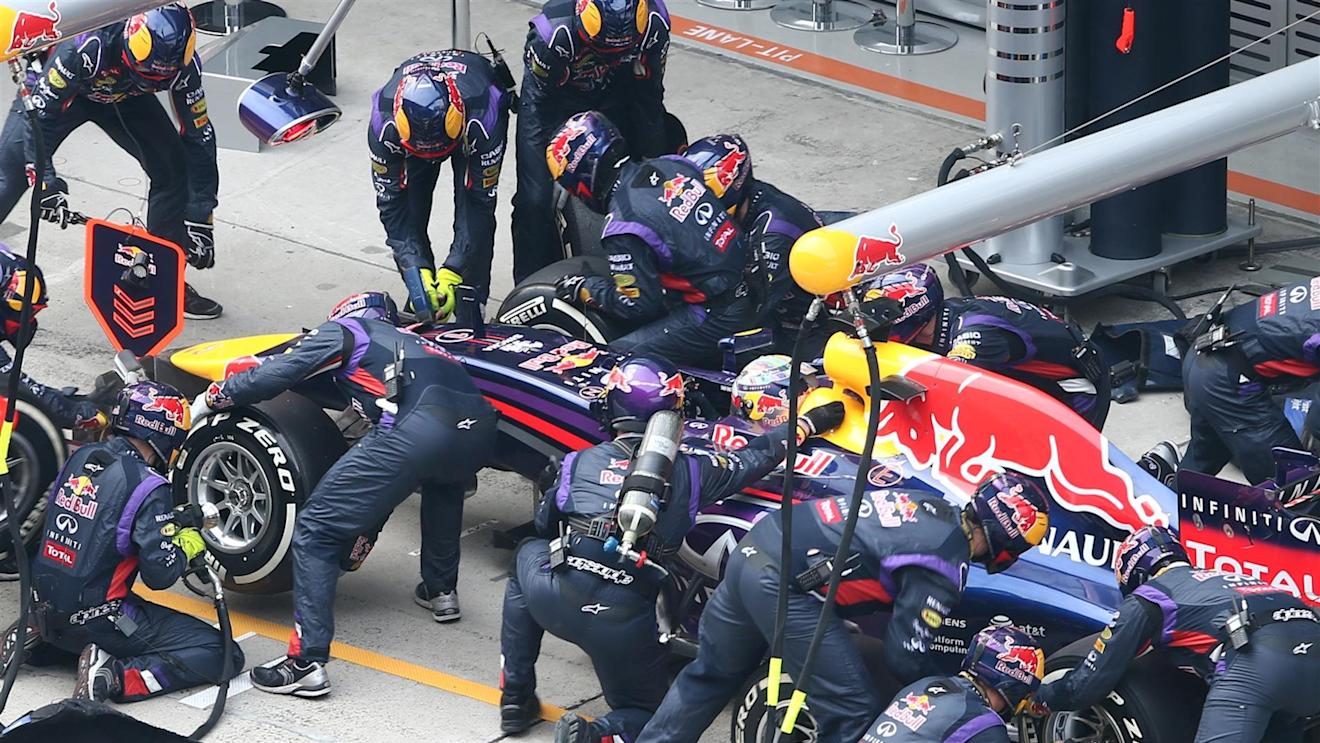Sebastian Vettel (GER) Red Bull Racing RB10 makes a pit stop. Formula One World Championship, Rd4, Chinese Grand Prix, Race, Shanghai, China, Sunday, 20 April 2014. © Sutton Images