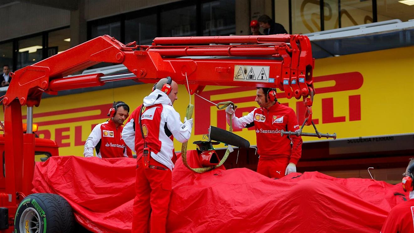 The car of Kimi Raikkonen (FIN) Ferrari F14 T is returned to the pits after stopping on track. Formula One Testing, Day One, Barcelona, Spain, Tuesday, 13 May 2014. © Sutton Images