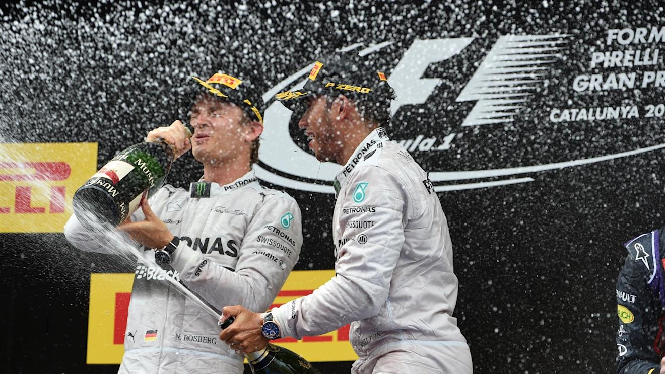 Race winner Lewis Hamilton (GBR) Mercedes AMG F1 celebrates on the podium with Nico Rosberg (GER) Mercedes AMG F1 and the champagne. Formula One World Championship, Rd5, Spanish Grand Prix, Race, Barcelona, Spain, Sunday, 11 May 2014. © Sutton Images