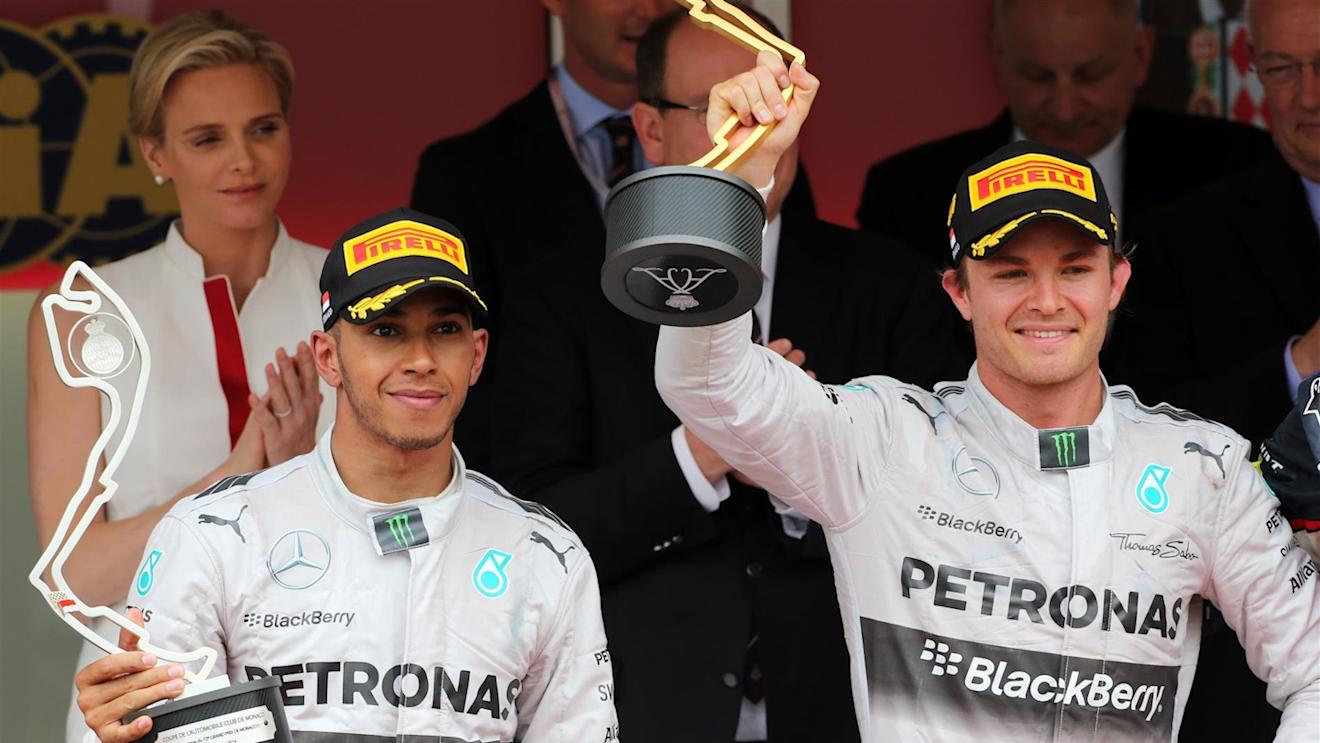 (L to R): Second placed Lewis Hamilton (GBR) Mercedes AMG F1 and race winner Nico Rosberg (GER) Mercedes AMG F1 on the podium. Formula One World Championship, Rd6, Monaco Grand Prix, Race, Monte-Carlo, Monaco, Sunday, 25 May 2014. © Sutton Images