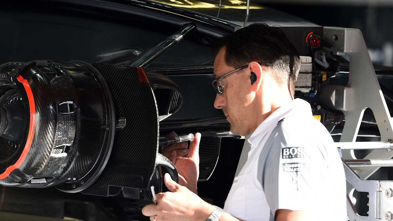 McLaren mechanic works on McLaren MP4-29 barke duct and wheel hub. Formula One World Championship, Rd5, Spanish Grand Prix, Practice, Barcelona, Spain, Friday, 9 May 2014. © Sutton Images