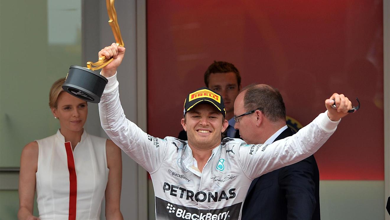 Race winner Nico Rosberg (GER) Mercedes AMG F1, centre, with HSH Prince Albert of Monaco (MON), right, and his wife SAS Princess Charlene (RSA), left, on the podium. Formula One World Championship, Rd6, Monaco Grand Prix, Race, Monte-Carlo, Monaco, Sunday, 25 May 2014