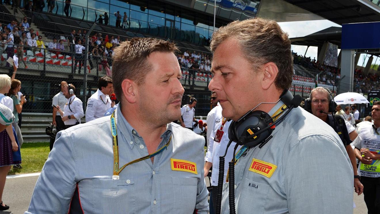 (L to R): Paul Hembery (GBR) Pirelli Motorsport Director and Mario Isola (ITA) Pirelli Sporting Director. Formula One World Championship, Rd8, Austrian Grand Prix, Race, Spielberg, Austria, Sunday, 22 June 2014