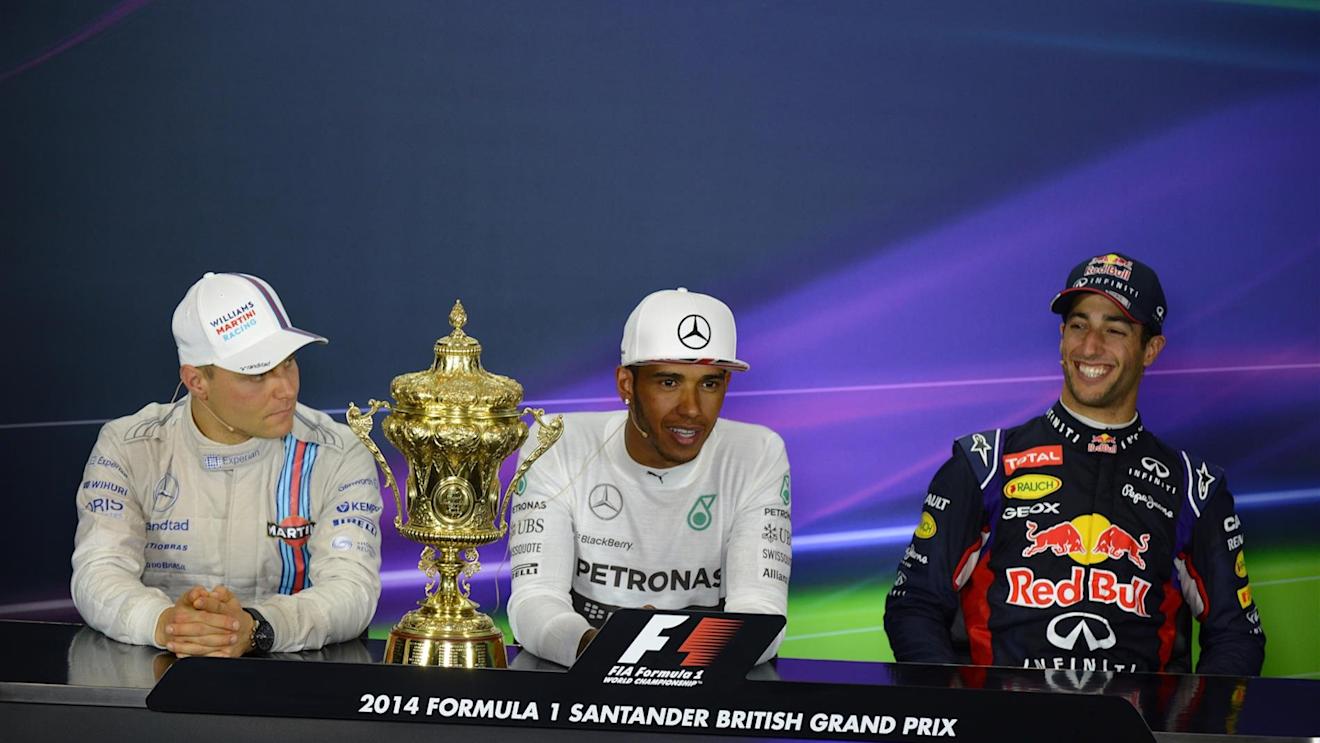(L to R): Valtteri Bottas (FIN) Williams, race winner Lewis Hamilton (GBR) Mercedes AMG F1 and Daniel Ricciardo (AUS) Red Bull Racing in the Press Conference with the trophy. Formula One World Championship, Rd9, British Grand Prix, Race Day, Silverstone, England, Sunday, 6 July 2014