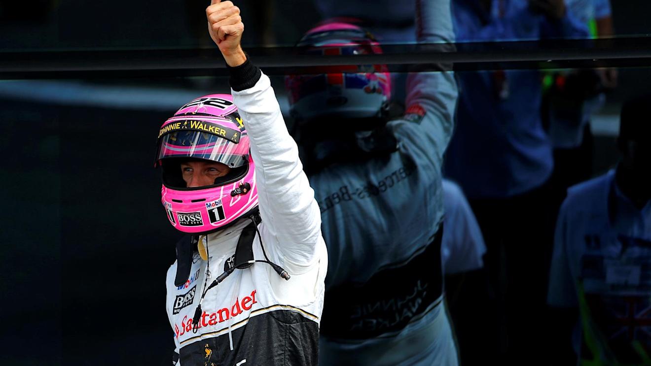Jenson Button (GBR) McLaren celebrates in parc ferme. Formula One World Championship, Rd9, British Grand Prix, Race Day, Silverstone, England, Sunday, 6 July 2014