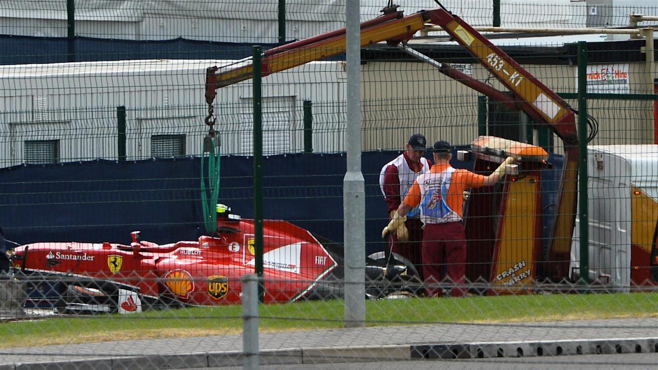 The crashed car of Kimi Raikkonen (FIN) Ferrari is recovered. Formula One World Championship, Rd9, British Grand Prix, Race Day, Silverstone, England, Sunday, 6 July 2014