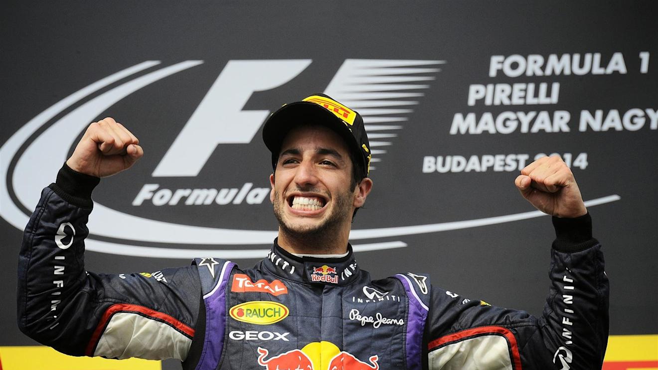 Race winner Daniel Ricciardo (AUS) Red Bull Racing celebrates on the podium. Formula One World Championship, Rd11, Hungarian Grand Prix, Race Day, Hungaroring, Hungary. Sunday, 27 July 2014. © Sutton Images