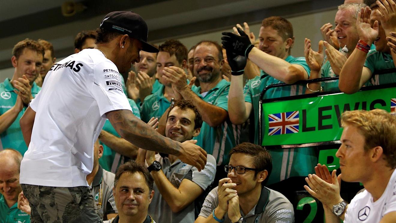 Race winner Lewis Hamilton (GBR) Mercedes AMG F1 celebrates with the team. Formula One World Championship, Rd14, Singapore Grand Prix, Marina Bay Street Circuit, Singapore, Race Day, Sunday, 21 September 2014