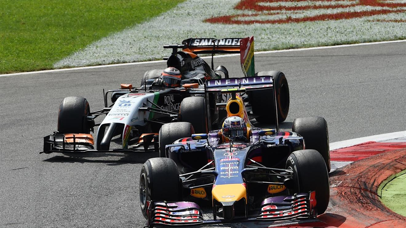 Daniel Ricciardo (AUS) Red Bull Racing RB10 leads Nico Hulkenberg (GER) Force India VJM07. Formula One World Championship, Rd13, Italian Grand Prix, Monza, Italy, Race Day, Sunday, 7 September 2014