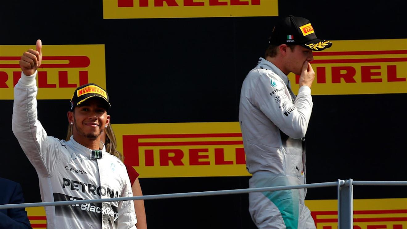 (L to R): Race winner Lewis Hamilton (GBR) Mercedes AMG F1 and second placed Nico Rosberg (GER) Mercedes AMG F1 on the podium. Formula One World Championship, Rd13, Italian Grand Prix, Monza, Italy, Race Day, Sunday, 7 September 2014